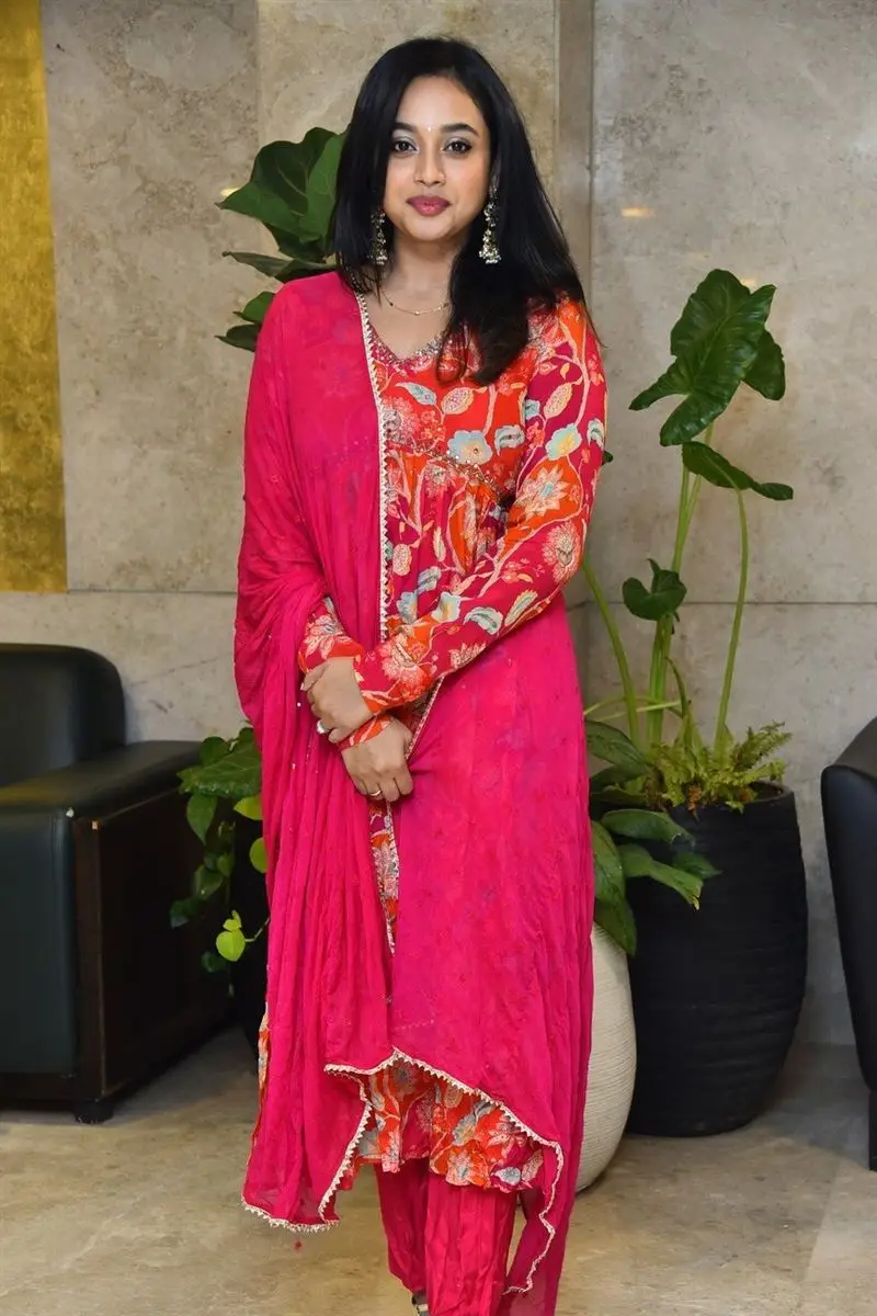 Telugu Girl Yasha Shivakumar in Orange Dress